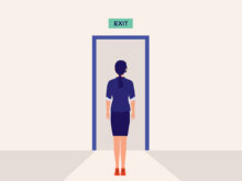 Woman walking out exit door